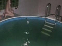 Handjob and sex with skinny brunette in the pool