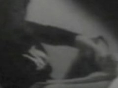 Black and white voyeur clip with a Japanese cutie in her bedroom