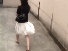 Fashionable bimbo wearing sexy skirt gets in the middle of sharking