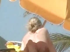 Sexy chicks are being filmed on the beach