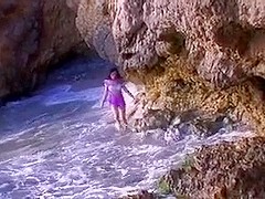 Nice beach sex with a French curly brunette taking things in her own hands jerking it and receivin.