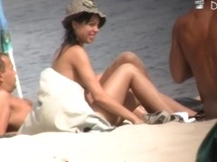 Mature bimbos get their panties in voyeur nudist beach video
