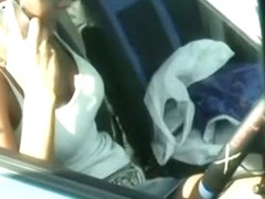 A quick glimpse at a blonde's crotch as she gets in the car