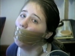 Girl Mouth Stuffed and Wrap Gagged