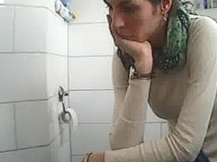 Skinny woman in bathroom caught on hidden camera
