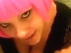 Pink wig wearing girl acquires a sperm flow