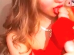 Katy in her red garter thong masturbating