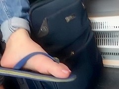 Candid feet on train 8