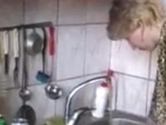 Russian moms Irina - having sex in the kitchen