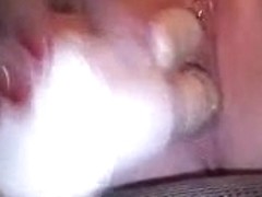 This babe filmed herself inserting toys in her pierced pussy