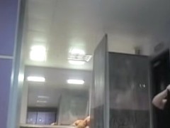 Changing room cutie with naked body sitting on voyeur cam