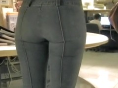 An elegant ass in tight pants in the mall candid