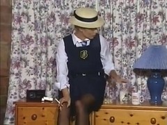 British school uniformed slut plays on bed with dildo