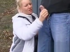 Blonde Woman Stroking Some Cock Outside