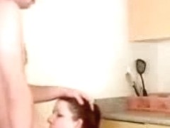 Homemade porn made by a young couple fucking in the kitchen