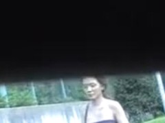 Sexy Asian with a thong got her skirt sharked while walking