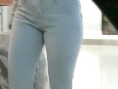 Amazing tight jeans complimenting her stunning ass