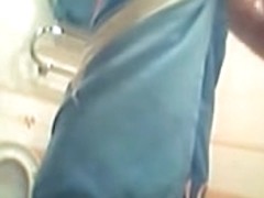 Hidden cam shower girl applying lotion on her slim body