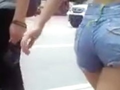 Cutie in denim shorts shakes her booty in public