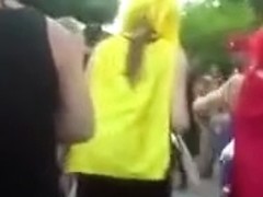 Busty ladies expose their jugs to the crowd