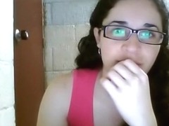 Hot nerdy glassed girl strips, dances and almost gets busted.
