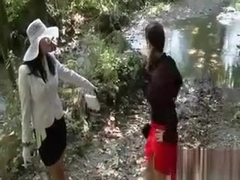 Lesbo Clothed Sluts Get Wet In The River
