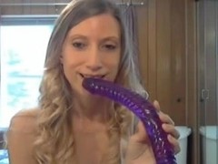 This Babe takes a giant sex-toy in her wazoo