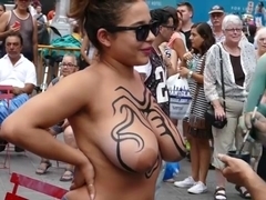 Big tits girl public body painting
