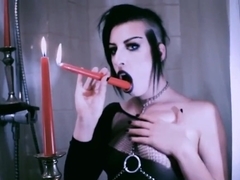 Vampire Goth Plays with Candles