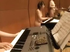 Naked Japanese girls play an orchestral concert