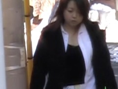 Busty Japanese lady grabbed from behind by a street sharker