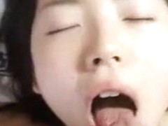Slutty Japanese wench receives jizz on her pretty face