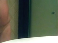 My wife naked in bathroom.