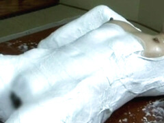 Asian teen mummification in plaster