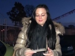 A young girl is offered cash for sex in a lot