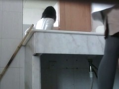 Voyeur pissing in the bathroom