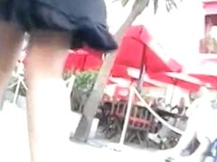Woman with long leng and pretty ass gets filmed upskirt