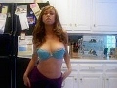 Big tits teen strisps in the kitchen