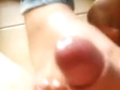 Hot sexy footjob with cute toes ends with a sperm shot