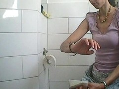 Voyeur hidden camera in a female bathroom caught peeing chick