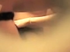 Girl spied through key hole baring tits off the bra