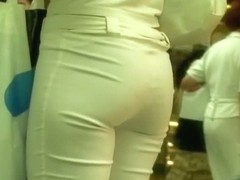 Hot white candid ass covered in tight white denim pants