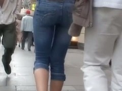 Golden haired beauty with bangs walks the streets candid porn
