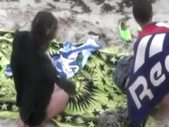Voyeur tapes a young couple having sex on a private part of the beach