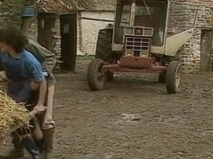 Old farmer has fun with his female employees