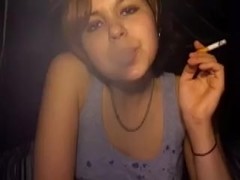 Cute emo immature smokes a fag on webcam