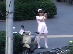 Naughty Asian girl is pissing in public part2