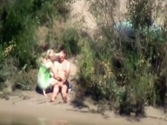 Spying on a sexy pair outdoors