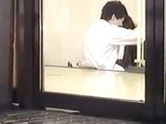 A hot Asian couple having sex on a spy cam video