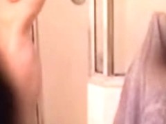Shower spy cam gets mature and hot brunette